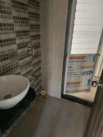Bathroom in 1 BHK Apartment at Bhairaav Goldcrest Residency, Ghansoli – for Sale