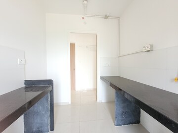 Kitchen in 1.5 BHK Apartment at Godrej Emerald, Ghodbunder Road – for Sale