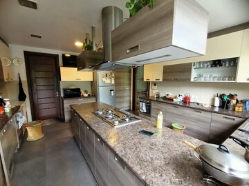 Kitchen in 6 BHK Independent House at Greenwood City, Sector 40 – for Sale