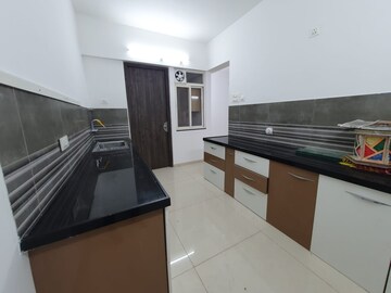 Kitchen in 3 BHK Apartment at Kolte Patil Elburz Hills & Dales , Nibm – for Rent
