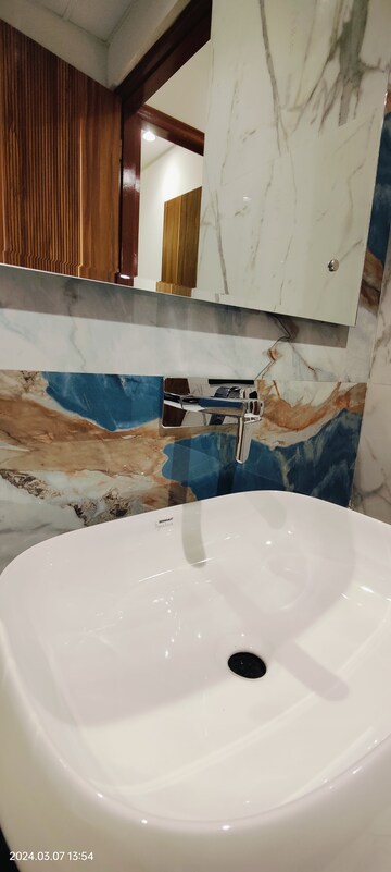 Bathroom in 3.5 BHK Apartment at Raj Nagar Extension – for Sale
