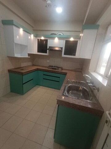 Kitchen in 2 BHK Apartment at Supertech Ecovillage II, Sector 16b Greater Noida – for Sale