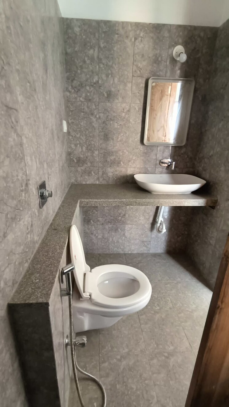 Bathroom, pride-manhattan 2 Bedroom 950 Sq.Ft. Apartment In Charholi Budruk Pune 7316237