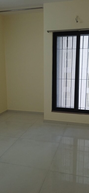 Room in 2 BHK Apartment at Dosti Desire, Brahmand – for Sale