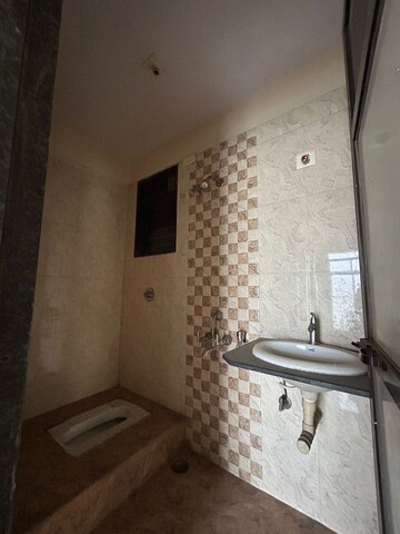 Bathroom in 4 BHK Apartment at Aum Supreme, Kalyan West – for Sale