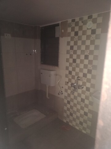 Bathroom in 2 BHK Apartment at VR Radha Regency, Mira Road – for Sale