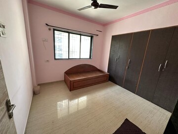 Bedroom in 2 BHK Apartment at Unnati Woods CHS, Kasarvadavali – for Sale