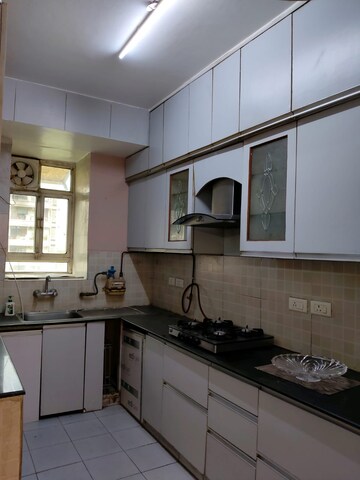 Kitchen in 3 BHK Apartment at Mahindra Luminare, Sector 59 – for Sale