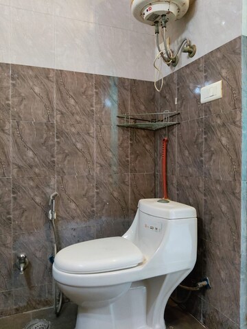 Bathroom in 3 BHK Apartment at Mahindra Luminare, Sector 59 – for Sale