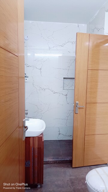 Bathroom in 3 BHK Builder Floor at Ashoka Enclave 3, Sector 35 – for Sale