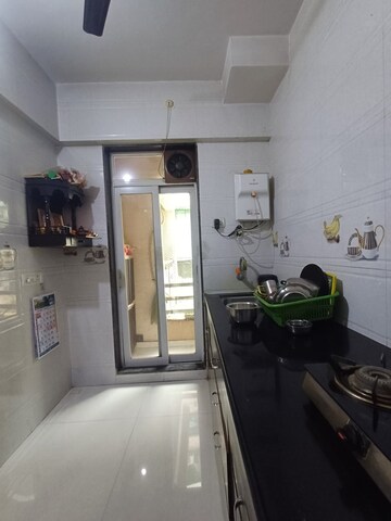 Kitchen in 1 BHK Apartment at Glenmor Residency, Kalwa – for Sale