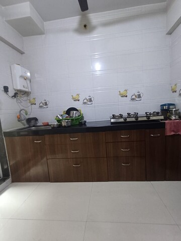 Kitchen in 1 BHK Apartment at Glenmor Residency, Kalwa – for Sale