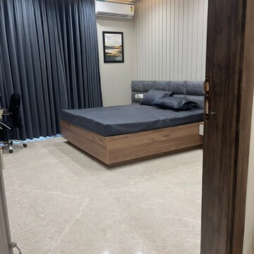 Bedroom in 4 BHK Builder Floor at Ansal Sushant Lok I, Sector 43 – for Rent