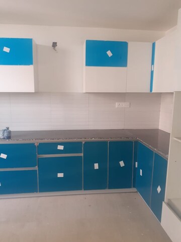Kitchen in 2 BHK Apartment at Amrapali Eden Park, Sector 50 – for Sale