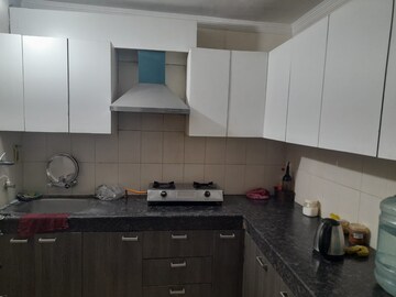 Kitchen in 2 BHK Apartment at Maya Garden City, Lohgarh – for Sale