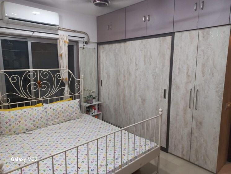 Bedroom, kanakia-spaces-niharika 2.5 Bedroom 950 Sq.Ft. Apartment In Manpada Thane 7319825