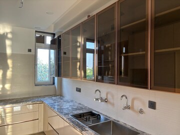 Kitchen in 3 BHK Apartment at Amrapali Princely Estate, Sector 76 – for Sale