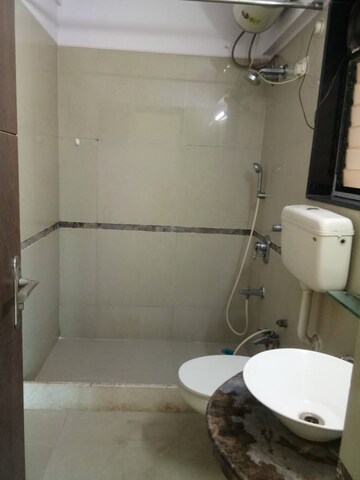 Bathroom in 2 BHK Apartment at Mukta Mahek, Kandivali East – for Sale