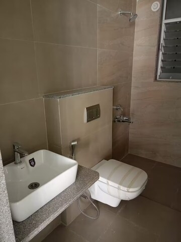 Bathroom in 2 BHK Apartment at Amrapali Silicon City, Sector 76 – for Sale