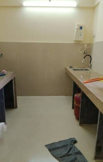 Kitchen in 1 BHK Apartment at Metropolis Aquaris Phase 1, Kasarvadavali – for Sale