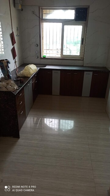 Kitchen in 2 BHK Apartment at Pride Presidency Luxuria, Ghodbunder Road – for Sale