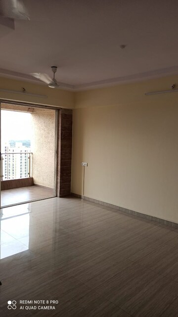 Living Room in 2 BHK Apartment at Pride Presidency Luxuria, Ghodbunder Road – for Sale