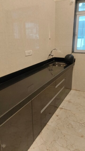 Kitchen in 1 BHK Apartment at SK Imperial Garden, Mira Road – for Sale