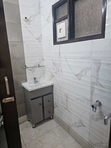 Bathroom in 3 BHK Builder Floor at Paschim Vihar – for Sale
