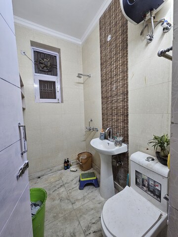Bathroom in 3 BHK Builder Floor at Green Fields Colony – for Sale