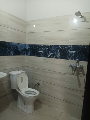 Bathroom in 2 BHK Apartment at Dhakoli Village – for Sale