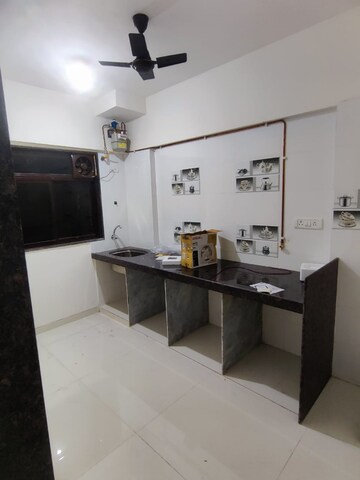 Kitchen in 1 BHK Apartment at Laxmi Umesh Apartments, Dahisar East – for Sale