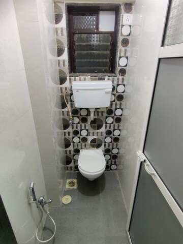 Bathroom in 1 BHK Apartment at Laxmi Umesh Apartments, Dahisar East – for Sale