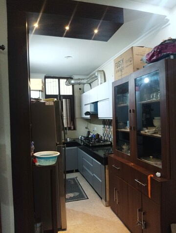 Kitchen in 2 BHK Apartment at Shri Devaji Residency, Dhakoli Village – for Sale