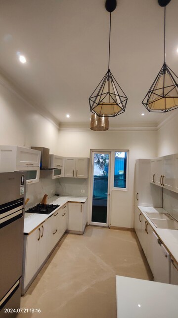 Kitchen in 4 BHK Apartment at T And T Eutopia Phase 1, Siddharth Vihar – for Sale