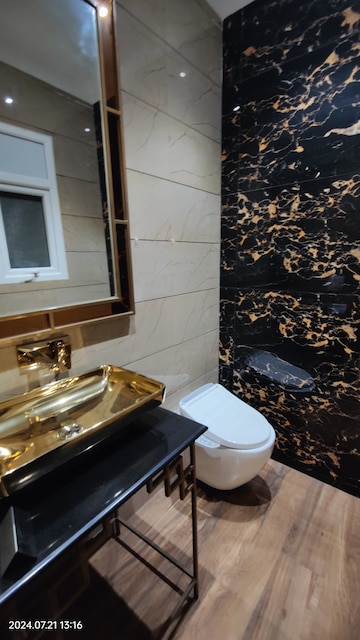 Bathroom in 4 BHK Apartment at T And T Eutopia Phase 1, Siddharth Vihar – for Sale