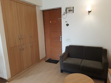 Living Room in 1 RK Apartment at Nimbus The Golden Palm, Sector 168 – for Sale