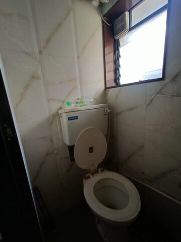 Bathroom in 1 BHK Apartment at Poonam Sagar CHS, Andheri East – for Sale
