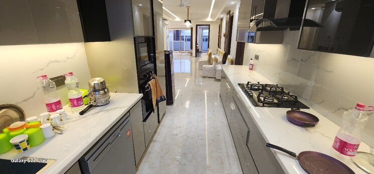 Kitchen, tata-raheja-raisina-residency 5 Bedroom 5953 Sq.Ft. Apartment In Sector 59 Gurgaon 7323877