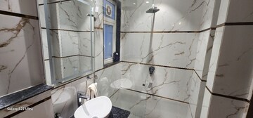 Bathroom in 5 BHK Apartment at Tata Raheja Raisina Residency, Sector 59 – for Sale