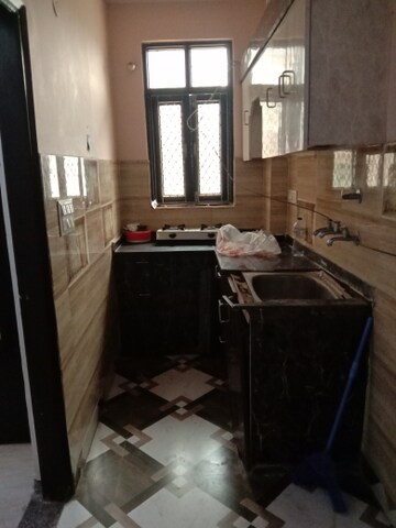 Kitchen in 2 BHK Builder Floor at Dwarka Mor – for Sale
