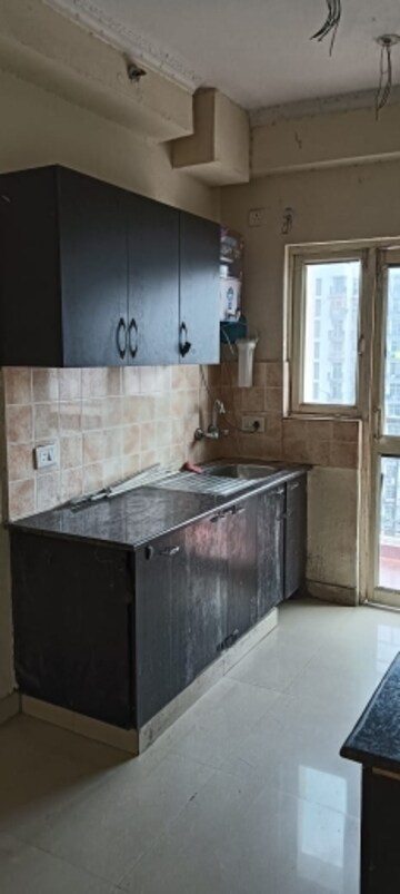 Kitchen in 2 BHK Apartment at Supertech Ecolofts, Sector 16b Greater Noida – for Sale