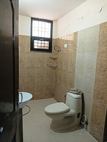 Bathroom in 2 BHK Apartment at Dhakoli Village – for Sale