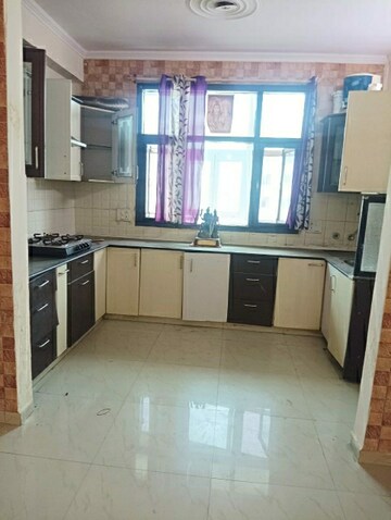 Kitchen in 2 BHK Apartment at Dhakoli Village – for Sale