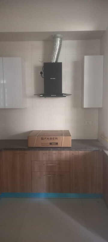 Kitchen in 3.5 BHK Apartment at 3C Lotus Boulevard, Sector 100 – for Sale