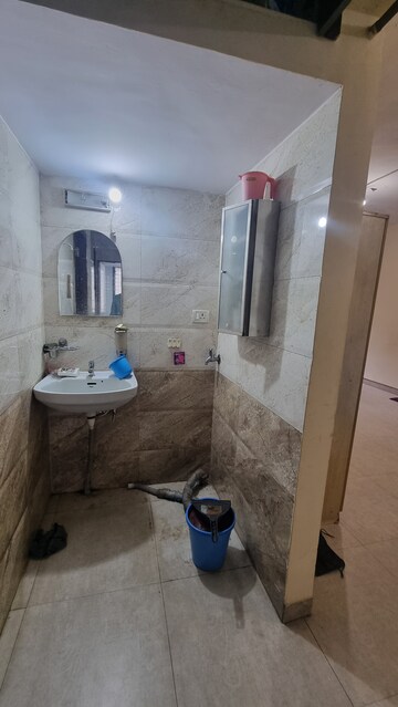 Bathroom in 2 BHK Apartment at Kopar Khairane – for Sale