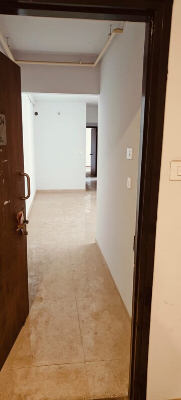 Building Lobby in 2.5 BHK Apartment at Lodha Palava City, Dombivli East – for Sale