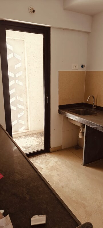 Kitchen in 2.5 BHK Apartment at Lodha Palava City, Dombivli East – for Sale