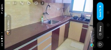 Kitchen in 1.5 BHK Apartment at Hiranandani The Walk, Ghodbunder Road – for Sale