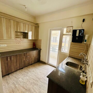 Kitchen in 2 BHK Apartment at Amrapali Centurian Park, Amrapali Dream Valley – for Sale