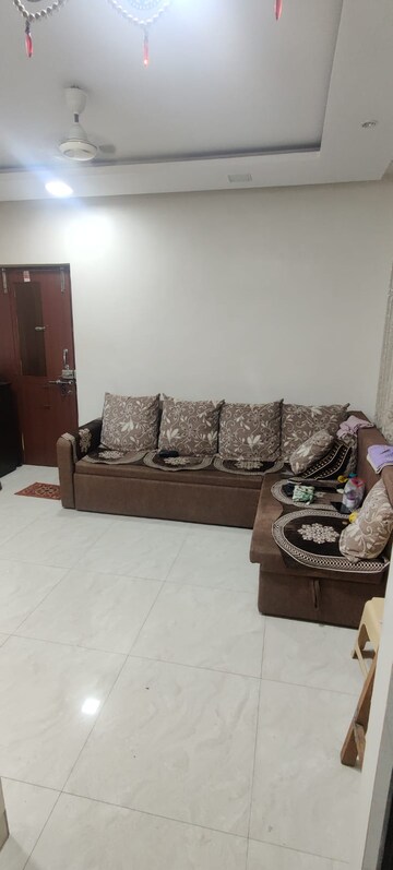 Living Room in 1 BHK Apartment at Gundecha Marigold, Kandivali East – for Sale